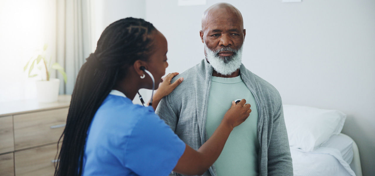 heart patient getting a checkup with stethoscope
